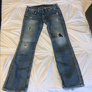 Woman’s distressed Silver jeans